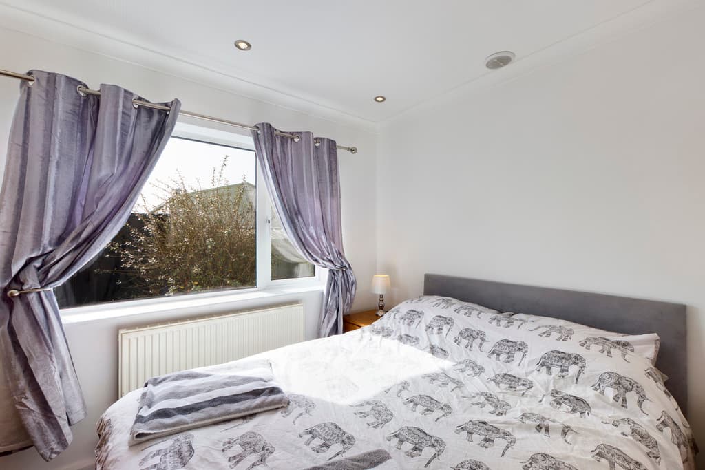 Elegant bedroom at Azy Venture Property